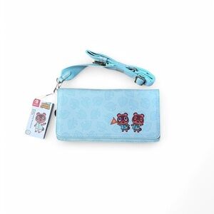 light blue animal crossing cross body bag